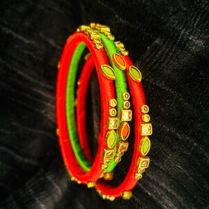 Vibrant Red and Green Bangles with Gold Accents